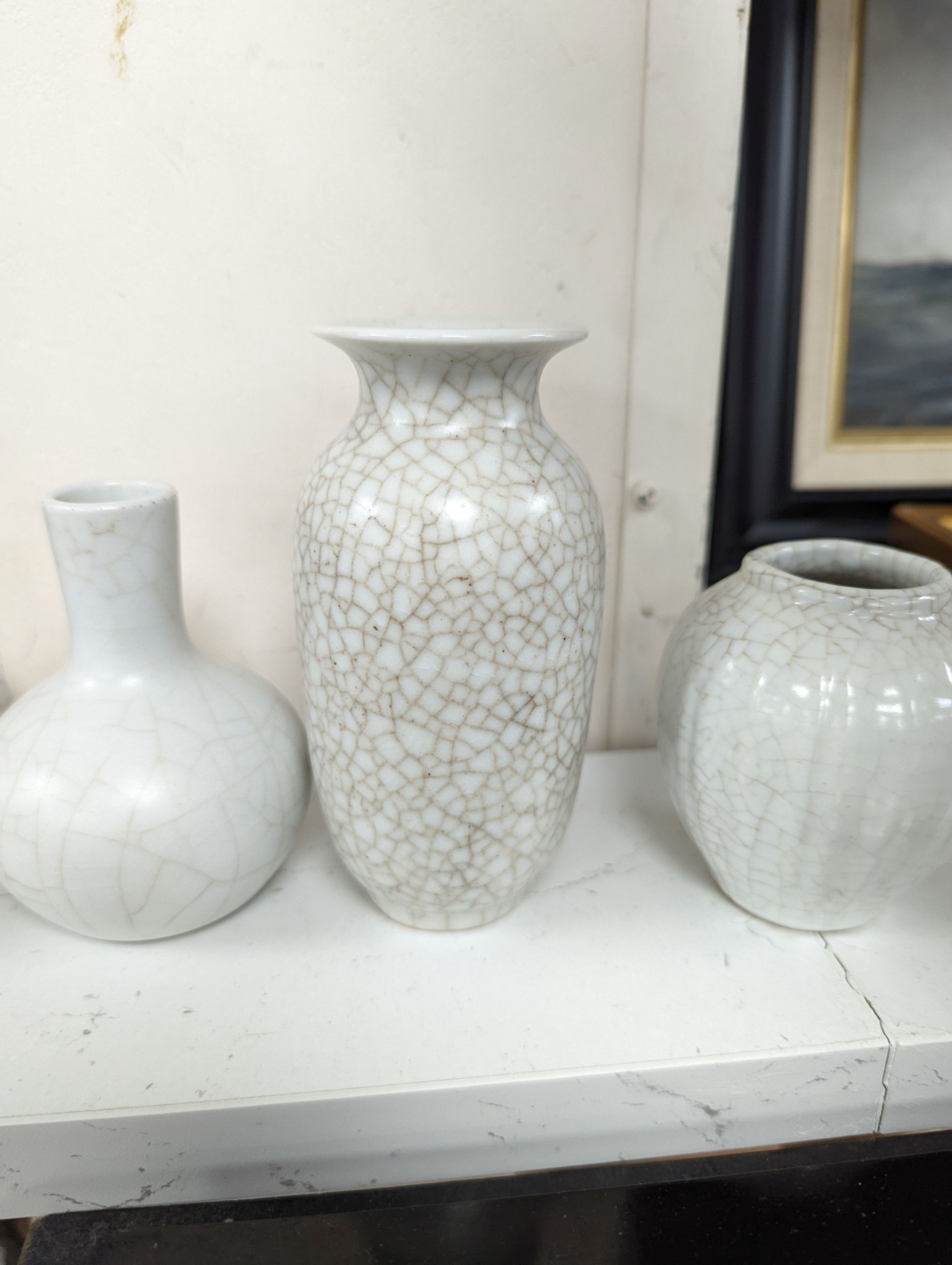 Four Chinese crackle glaze vases, tallest 16 cms high.